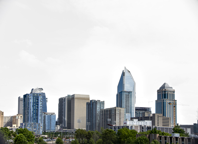 Buildings In City Against Clear Sky