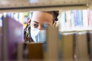 Young woman in the Library