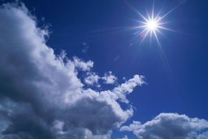 Scattered cumulus clouds and bright sun