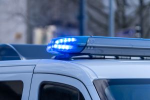 Low Angle View Of Blue Flash Light Of Police Car