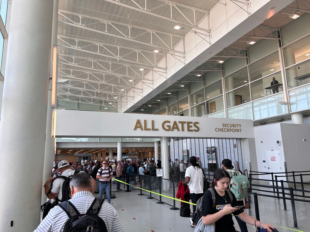 TSA security check with long lines and crowds of people at Charlotte International Airport, North Carolina