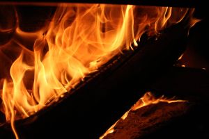 Roaring Fireplace with Burning Logs