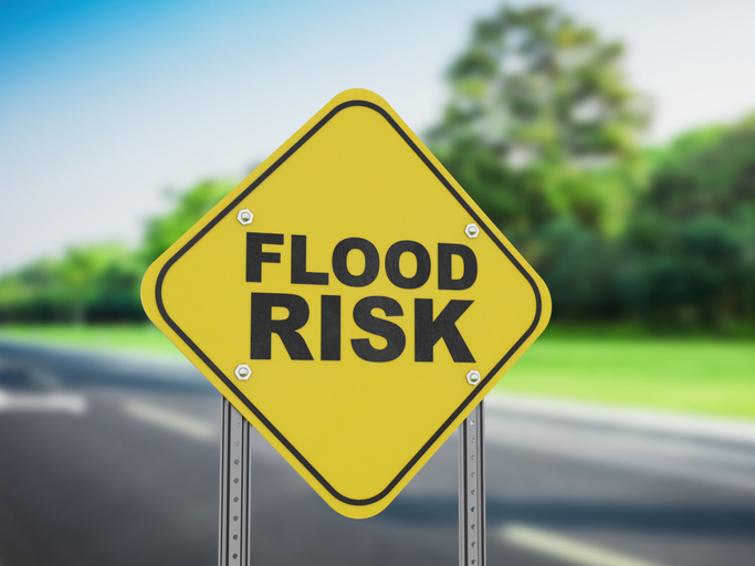 Flood Risk Warning Sign For Natural Disaster Awareness
