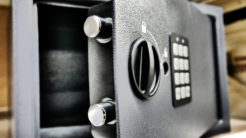 Close-up of a safe with the door open